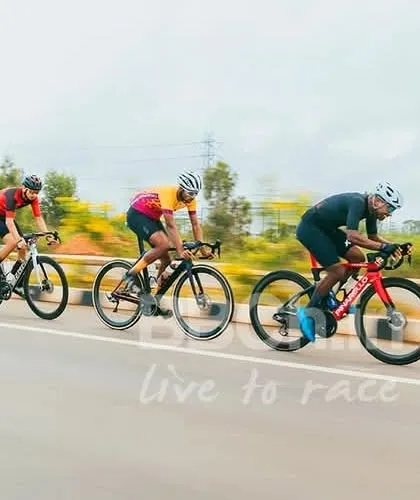 Three riders in a breakaway, pushing the limits on the open road. The dynamics of a small group escape are always exciting to watch.