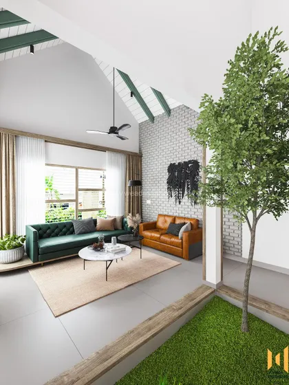 We love pushing creative boundaries. This modern duplex in Calicut features a stunning indoor courtyard with a high ceiling and a swing, creating a unique focal point that connects different living areas. The design blends a Scandinavian color palette with natural materials like brick and laterite stone for a home that is both modern and grounded.