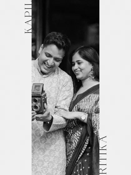An artistic, vertically formatted portrait of the couple in Varanasi, perfect for sharing their story.