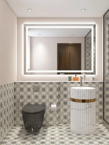 A bathroom design featuring a white marble pedestal sink and a large, backlit mirror for excellent vanity lighting.