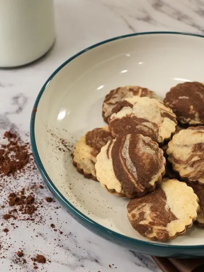 A perfect blend of taste and beauty. My marble cookies combine vanilla and chocolate dough to create a visually stunning and delicious treat that's a feast for the senses.