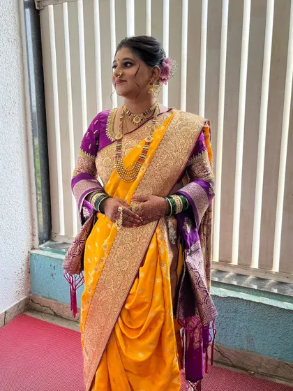 The bridal glow is real. Here, Saloni looks stunning against the natural light, showcasing the flawless, unedited makeup.
