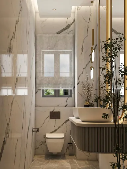 A compact yet elegant powder room design. I used floor-to-ceiling marble tiles to create a sense of height and luxury, while the wall-mounted toilet and minimalist vanity keep the floor clear and the space feeling open.