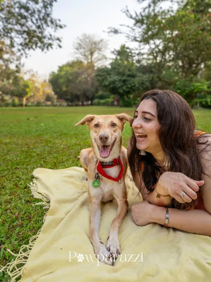 A happy portrait of Noor the Indie dog with her mom. The joy on both their faces is a beautiful tribute to the love that comes from adoption.