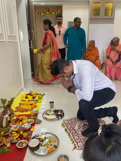 The Griha Pravesh ceremony in progress. It is an important ritual that marks the auspicious entry into a new home, and I am always happy to be a part of it.