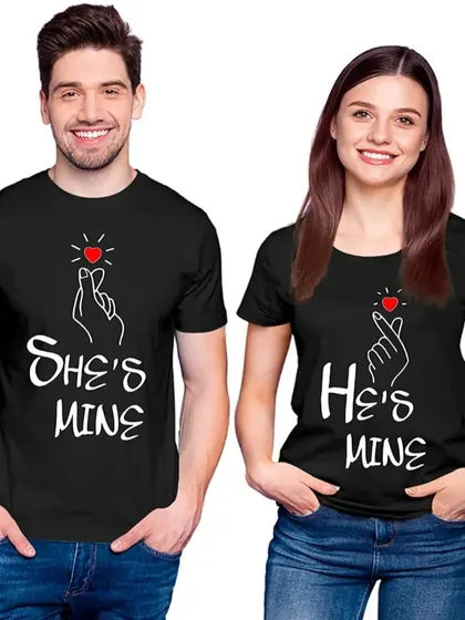 A trendy couple t-shirt set with the Korean finger heart gesture, saying 'She's Mine' and 'He's Mine.'