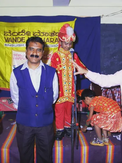 On stage with my mom and dad at an award function in 2008. Their support has been the real magic behind my entire journey.