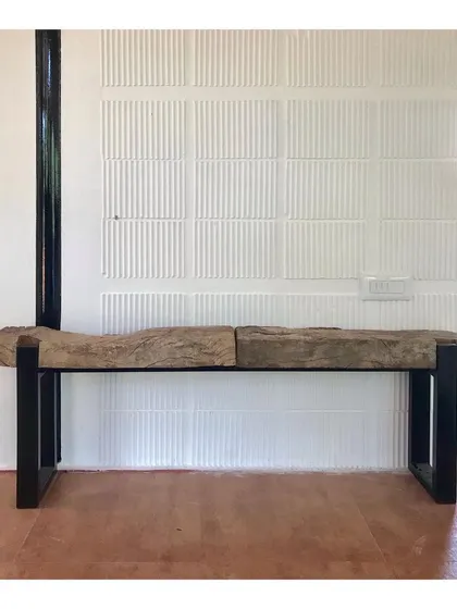 This bench was created for a private farmhouse project, designed with sustainability in mind. I used locally sourced wood for the raw, organic seat and paired it with a minimal black metal frame, focusing on creating beautiful furniture with minimal wastage.