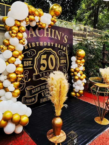 Celebrating a milestone? I create stylish, personalized themes for adults, like this "Aged to Perfection" 50th birthday. The classic black and gold design, complete with a custom backdrop and elegant pampas grass, is perfect for a sophisticated celebration.