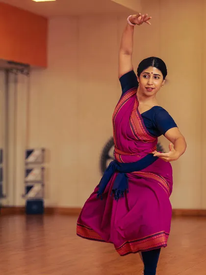 A studio portrait capturing a moment from my dance to a Rabindrasangeet. Connecting my Bharatanatyam practice with my Bengali heritage is deeply fulfilling.