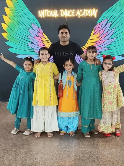Posing with our talented young dancers at the Greenfield studio. Their energy and enthusiasm are what make teaching so rewarding.