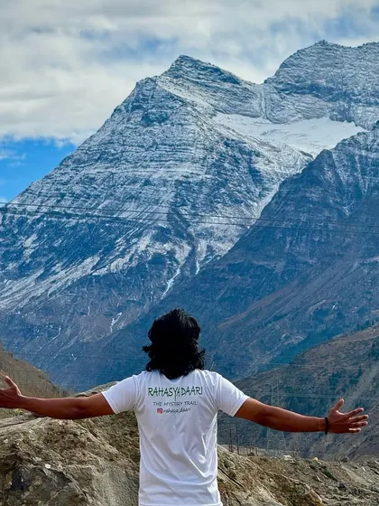 Embracing the Himalayas. A photo from our winter trip to Sissu in Himachal Pradesh, with the snow-covered peaks creating a majestic backdrop.