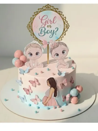 A sweet gender reveal cake with a "Girl or Boy?" theme. This homemade, eggless chocolate cake is filled with roasted almonds and covered in fresh whipping cream.