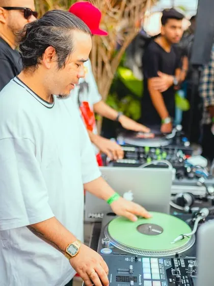 Breaking a sweat during an intense outdoor set. I give my all to every performance, no matter the venue.