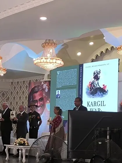 Dignitaries on stage during the book launch event.