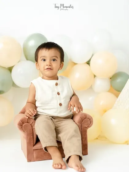 Sitting like a little king on his throne. This tiny armchair is a perfect prop for a sitter session, making the baby feel comfortable and confident.
