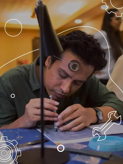 With intense focus, a participant carefully places a tiny component into the watch movement. Our horology workshops provide all the professional tools and guidance needed to explore this delicate and rewarding craft.