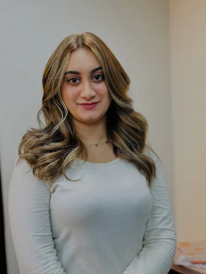 This look proves that ash blonde can be both edgy and soft. The client's happy expression is the best review.