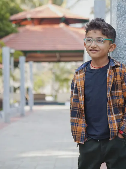 A relaxed outdoor portrait of a young boy. I use natural light and comfortable poses to capture a child's personality in a way that feels both stylish and authentic.