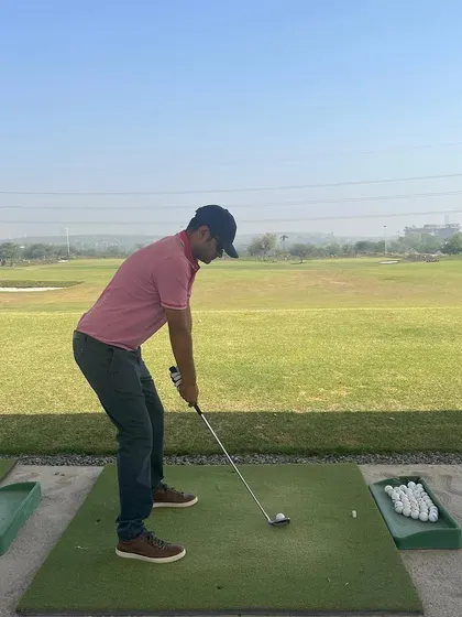 A player lines up his shot on a beautiful weekend day. Getting outside and enjoying the fresh air is what it's all about.
