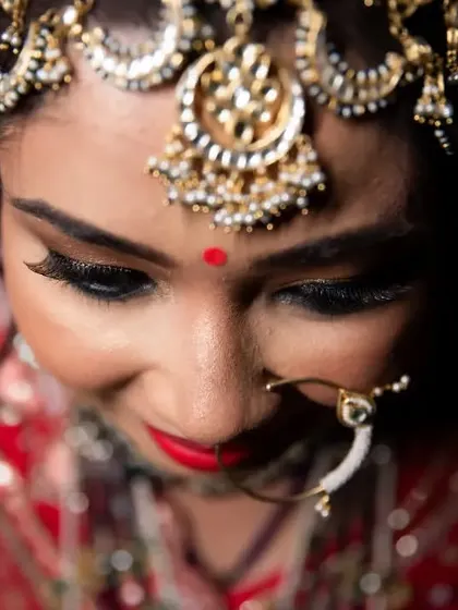 Another beautiful close-up of the bride's face, her expression soft and dreamy.