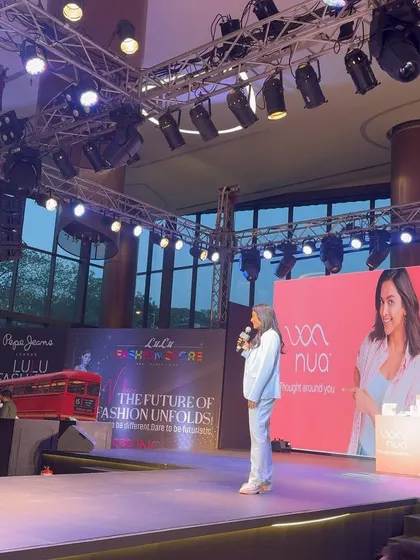 A side view of the stage where I spoke about breaking the stigma of talking about periods. In my classes and talks, I make it a point to use clear, direct language to normalize the female experience and foster open dialogue.