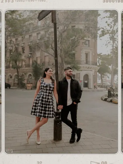A classic, happy couple portrait with vintage film-style editing.