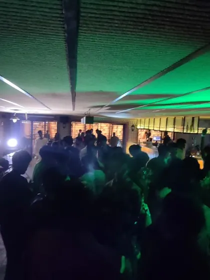 A glimpse of the packed dance floor at a Jain College freshers party, showing my popularity with the student demographic.