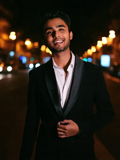 A candid shot of my client at Cannes, looking relaxed and confident in his bespoke tuxedo. That's the goal: to make you feel as good as you look.