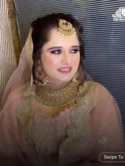 A beautiful candid-style shot. The makeup is designed to look flawless from every angle, enhancing her features without being overpowering.