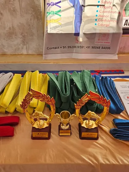 The rewards of hard work laid out for our students. New belts, trophies, and certificates await the fighters who pass their promotion exam.