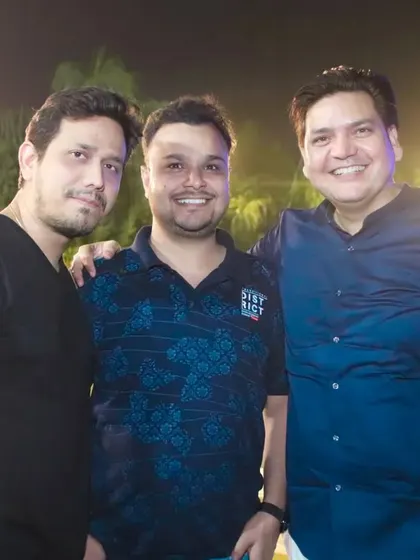 A group of friends posing for the camera at an outdoor event. My photography captures the relaxed and happy vibe of your party.
