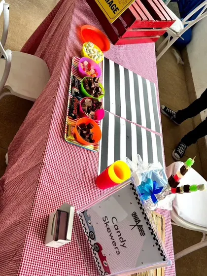 An overhead view of the candy station at the Dinky Car party. I set up candy skewers and other treats for kids to enjoy throughout the celebration.