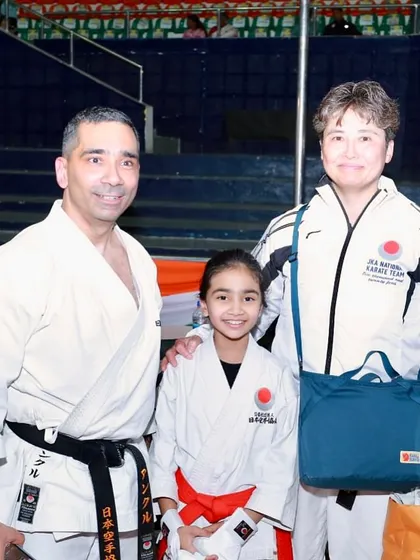 It is an honor to provide my students with opportunities to meet and learn from senior instructors from the JKA Headquarters in Japan. Here, one of my students stands with a JKA National Team member, a testament to our direct link to karate's highest tradition.