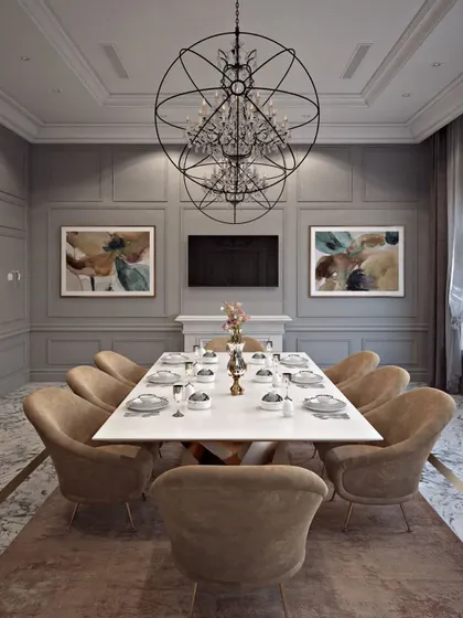 A full view of the formal dining room, showing the paneled walls and symmetrical art placement that create a balanced, elegant atmosphere.