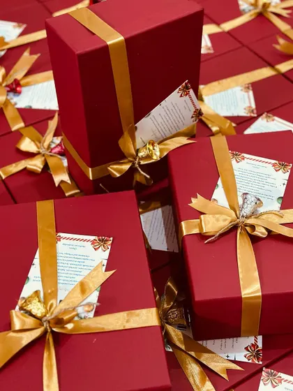 Multiple gift boxes ready for a corporate client, showcasing our attention to detail in packaging and presentation for large orders.