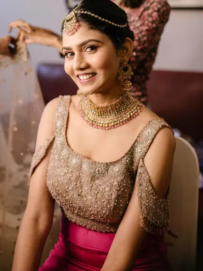 A stunning dewy makeup look with a subtle glittery eye. This bride is radiating pure elegance and joy for her pre-wedding celebration.