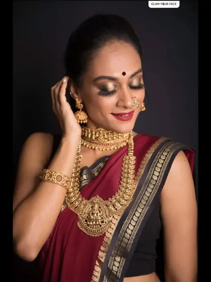 Another shot of this stunning full glam look. The focus is on beautifully blended eyeshadow and flawless skin, creating a look that is both powerful and sophisticated.