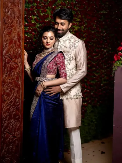 A romantic couple's portrait from their reception. The bride's elegant makeup and the groom's classic attire create a picture of timeless style.