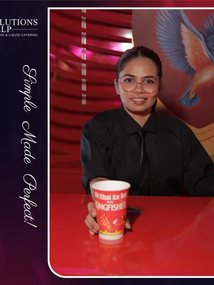 Another of our talented female mixologists, ready to serve perfect cocktails in impeccable attire.