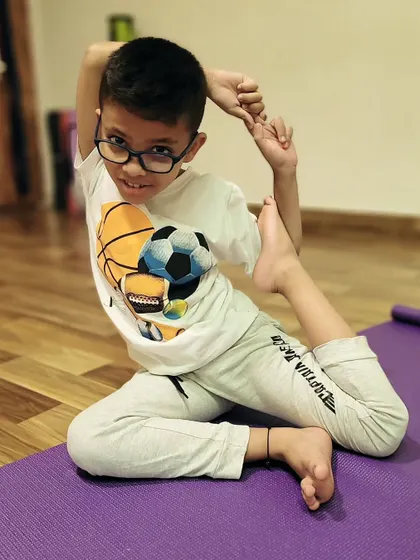 This young yogi shows incredible focus and flexibility. Each child progresses at their own pace, and I celebrate every milestone with them.