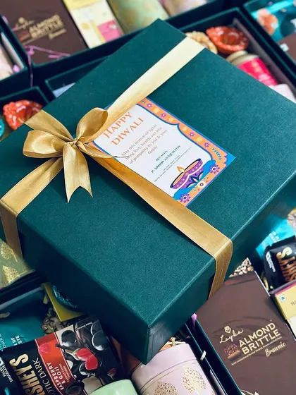 A slightly different angle of the corporate Diwali hamper, emphasizing the quality of the packaging and the festive tag.