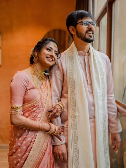A vibrant varmaala ceremony with colorful smoke, creating a truly spectacular and modern moment. We love capturing both the tradition and the unique personality of your wedding.