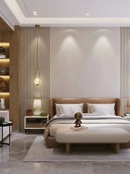 A tranquil bedroom defined by muted neutrals and earthy tones. The design uses warm wood accents and layered lighting to create a calming and natural ambiance.
