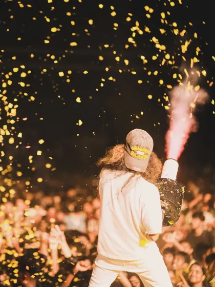 Another angle of the confetti cannon in action, capturing the excitement and visual splendor of the moment.