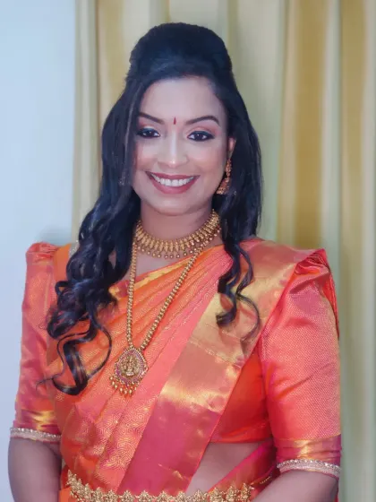 A smiling portrait that captures the joy and radiance of the client.