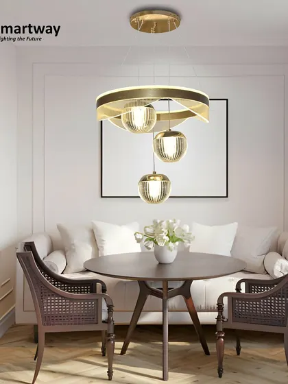 A beautiful shot of our ribbed glass globe chandelier in a dining setting. The design is modern yet timeless, providing warm, inviting light for meals and conversations.