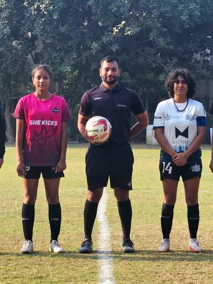 The match officials and team captains pose before kickoff, a customary sign of respect and fair play that we uphold in every game.
