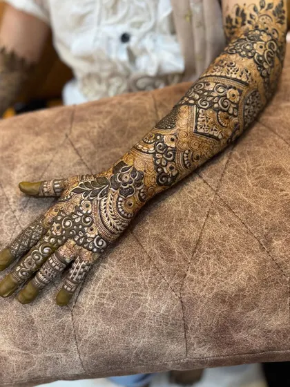 This is a detailed view of my intricate bridal henna work. Each design is unique, combining traditional patterns like paisleys and mandalas with fine-line fillers to create a stunning, full-coverage look for your special day.