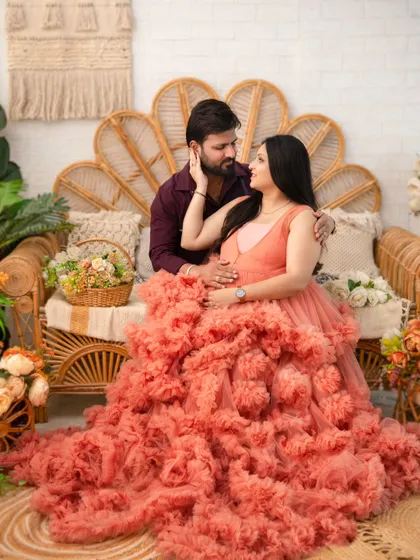 Lost in their own world. This intimate shot captures a quiet moment of connection, with the couple gazing lovingly at each other amidst the romantic, rustic setting.